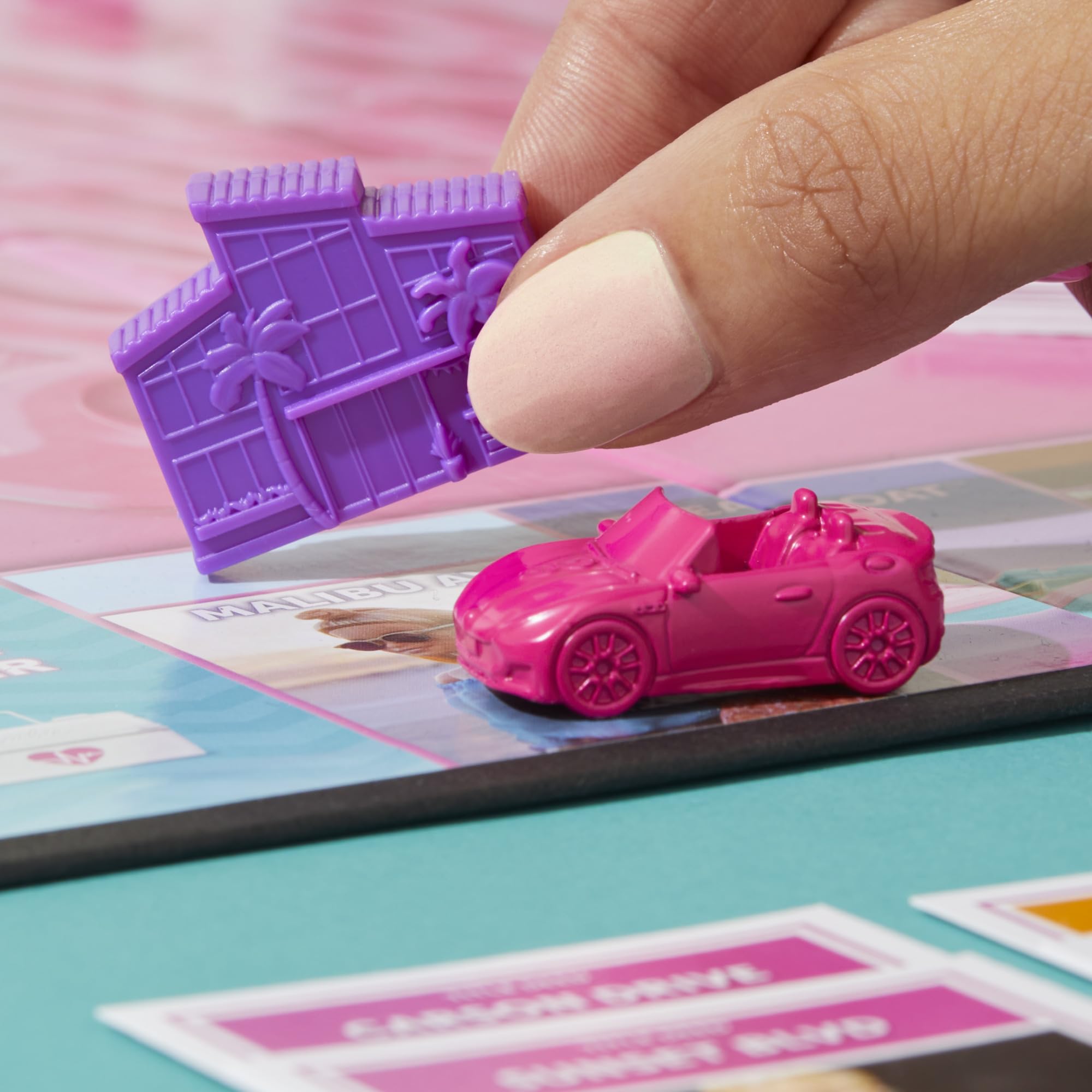Monopoly: Barbie Edition Board Game, Ages 8+, 2-6 Players, Fun Family Games for Kids and Adults, with 6 Barbie-Themed Pink Zinc Tokens, Kids Gifts - Image 7